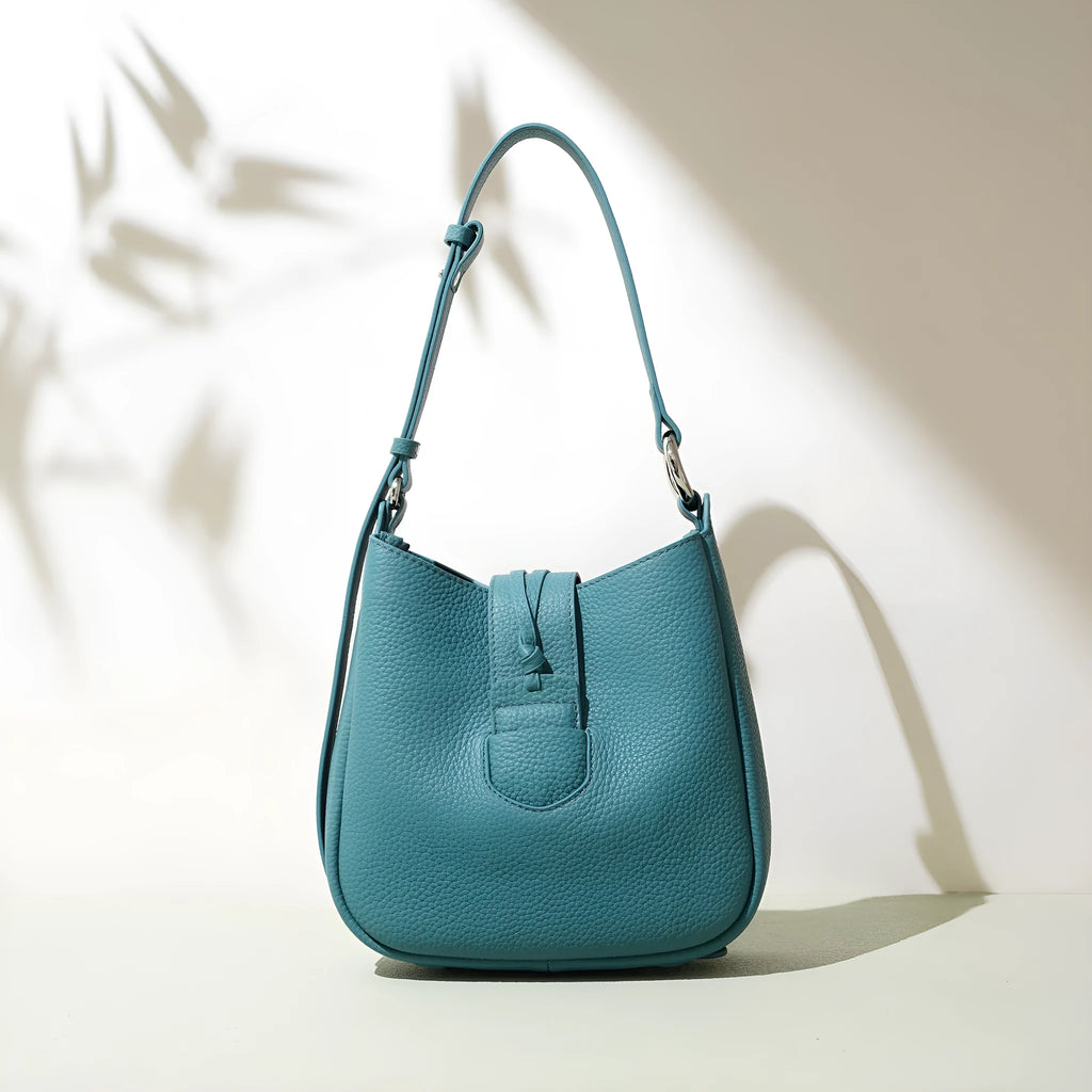 Large capacity commuter soft leather crossbody bag in bucket shape with sewing line details