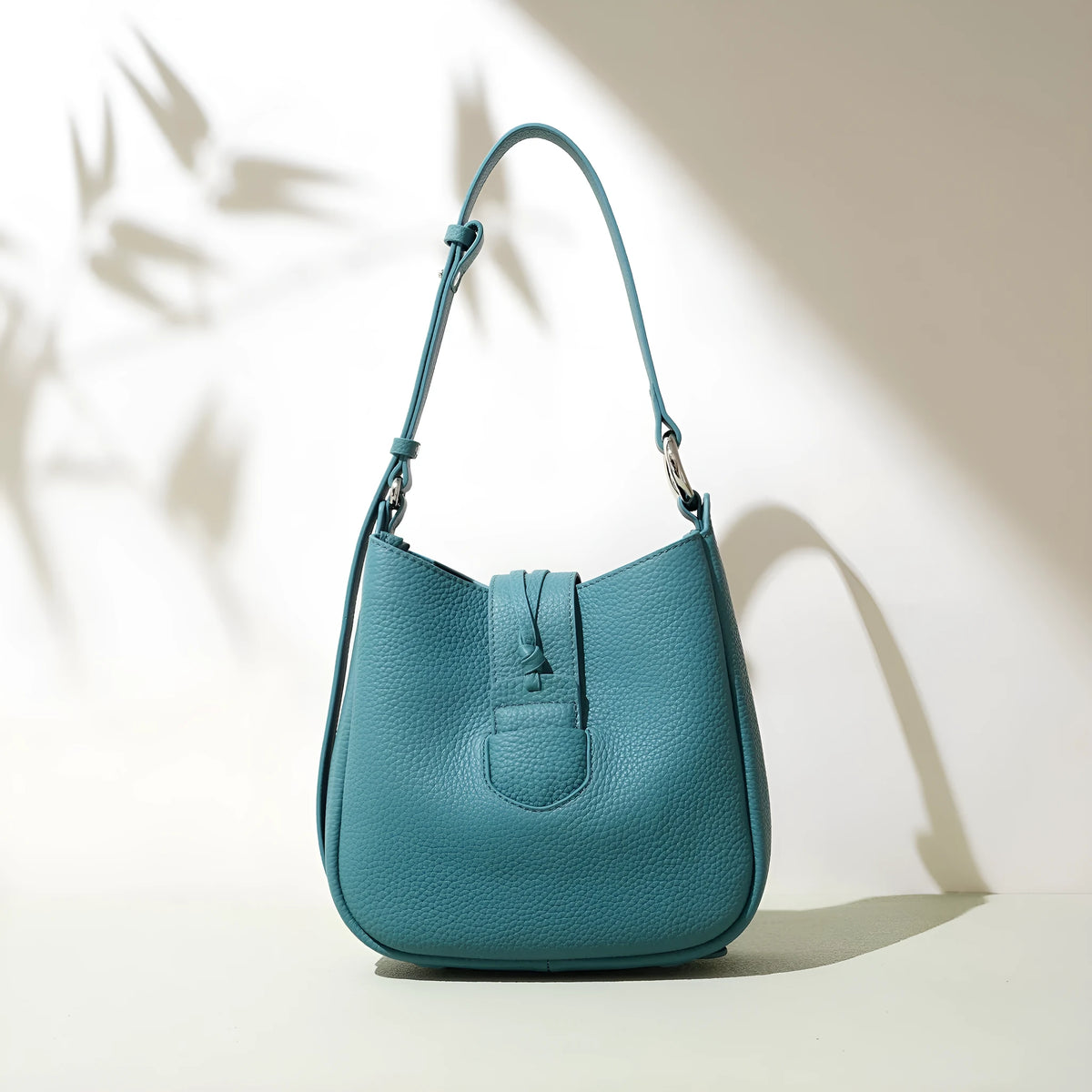 Large capacity commuter soft leather crossbody bag in bucket shape with sewing line details
