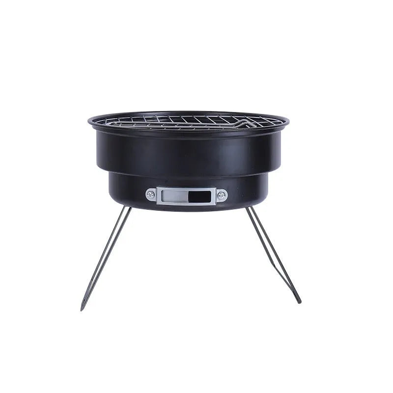 Small round metal folding ice stove with grill mesh and leg, packed in a carry bag for outdoor barbecues.