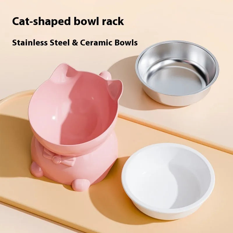 Slanted stainless steel cat bowl in blue with weighted silicone non-slip base on a wooden floor.