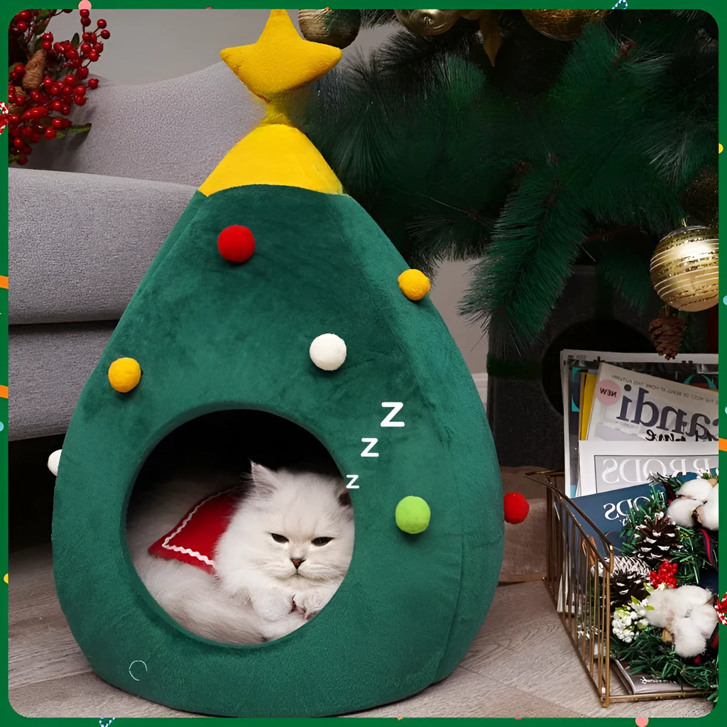 Red Christmas tree shaped plush cave bed for a cat or small dog on a wooden floor