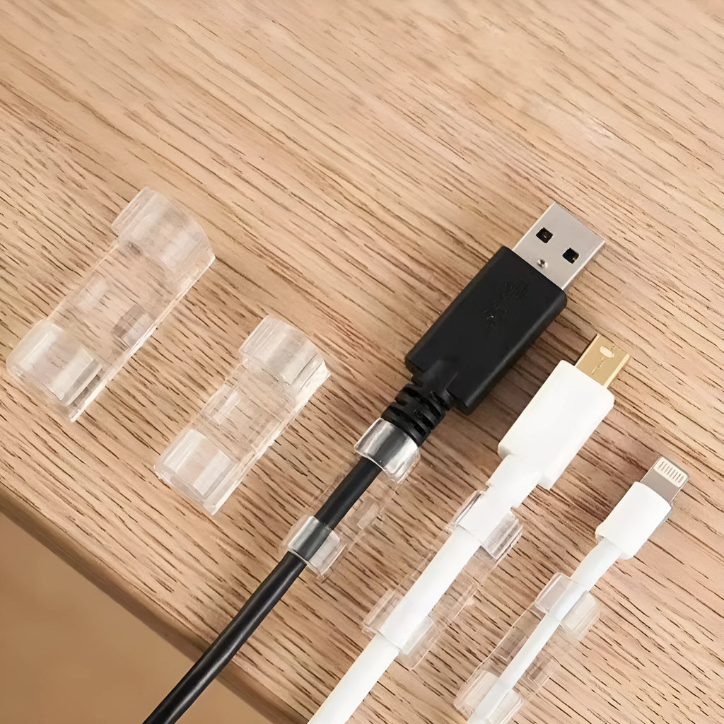 Transparent plastic self-adhesive cable clips for wire organisation in four size options