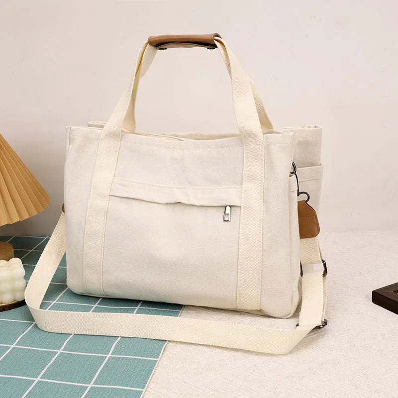 Canvas tote bag with multiple compartments in Army Green colour showing internal organisers