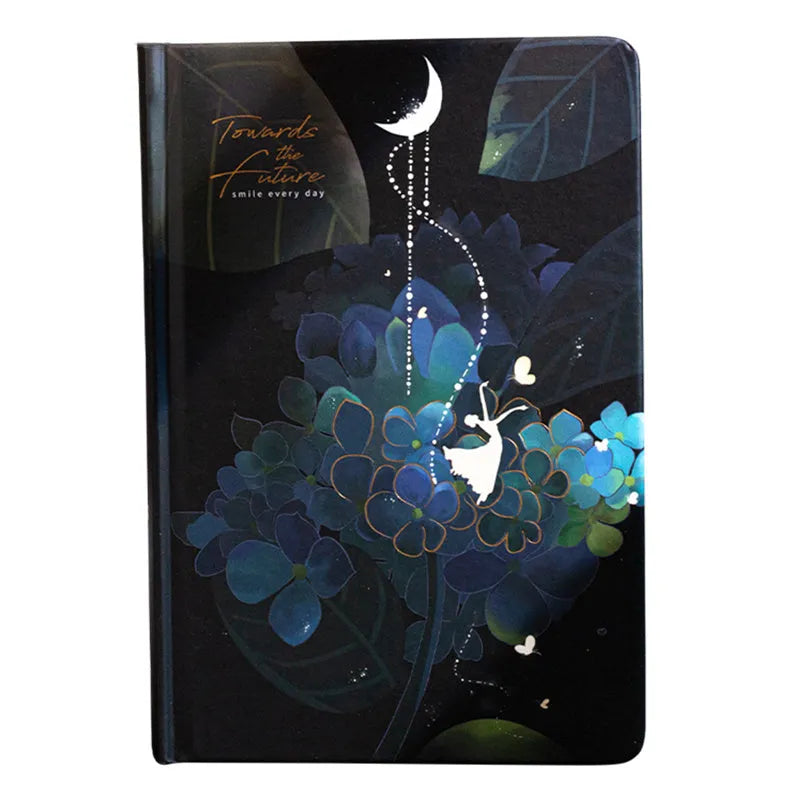 A5 spiral-bound notebook with a luminous coloured cover, open to show lined pages with colour illustrations.