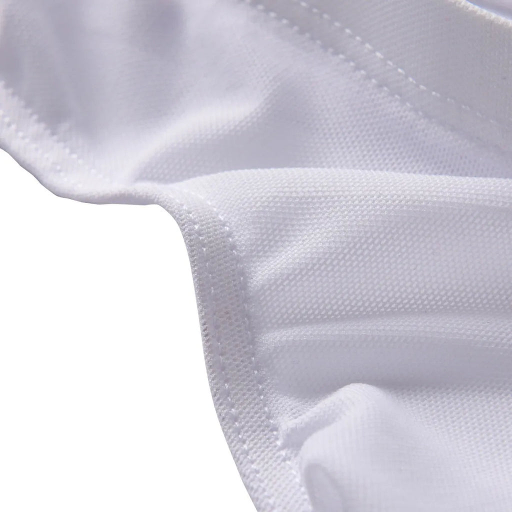 Men's black low-rise nylon briefs laid flat, showing the knit fabric texture and waistband.