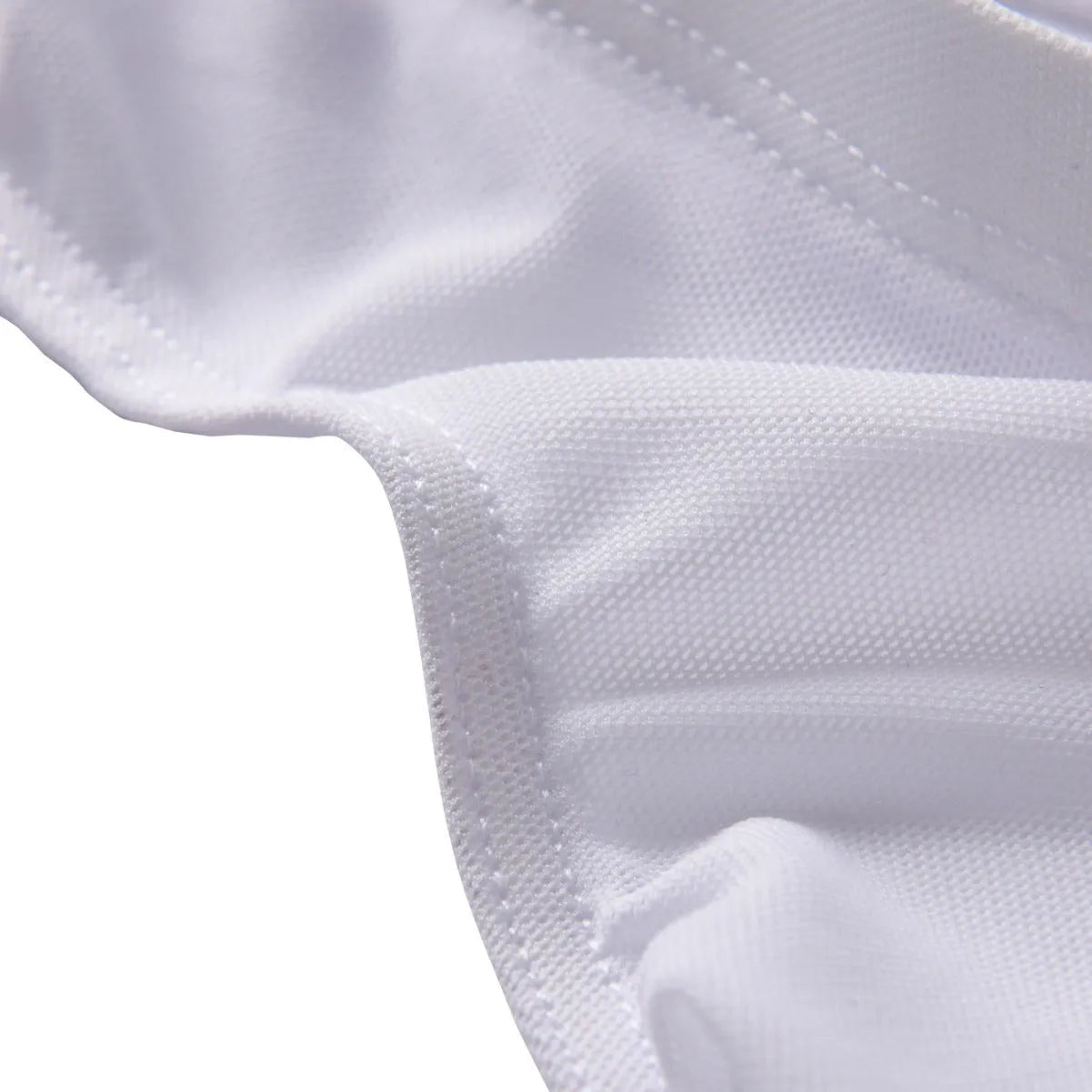 Men's black low-rise nylon briefs laid flat, showing the knit fabric texture and waistband.