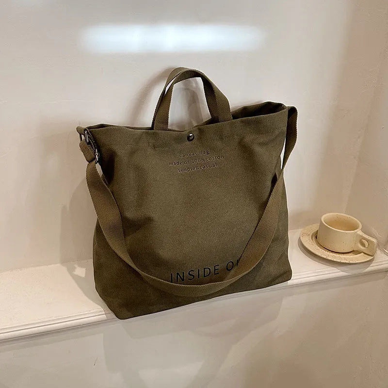 Large-capacity canvas tote bag with alphabet print and adjustable strap in coffee colour