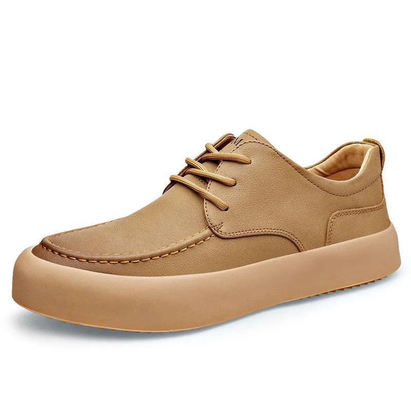 Men's brown and black lace-up casual platform trainers with a round toe and flat heel.