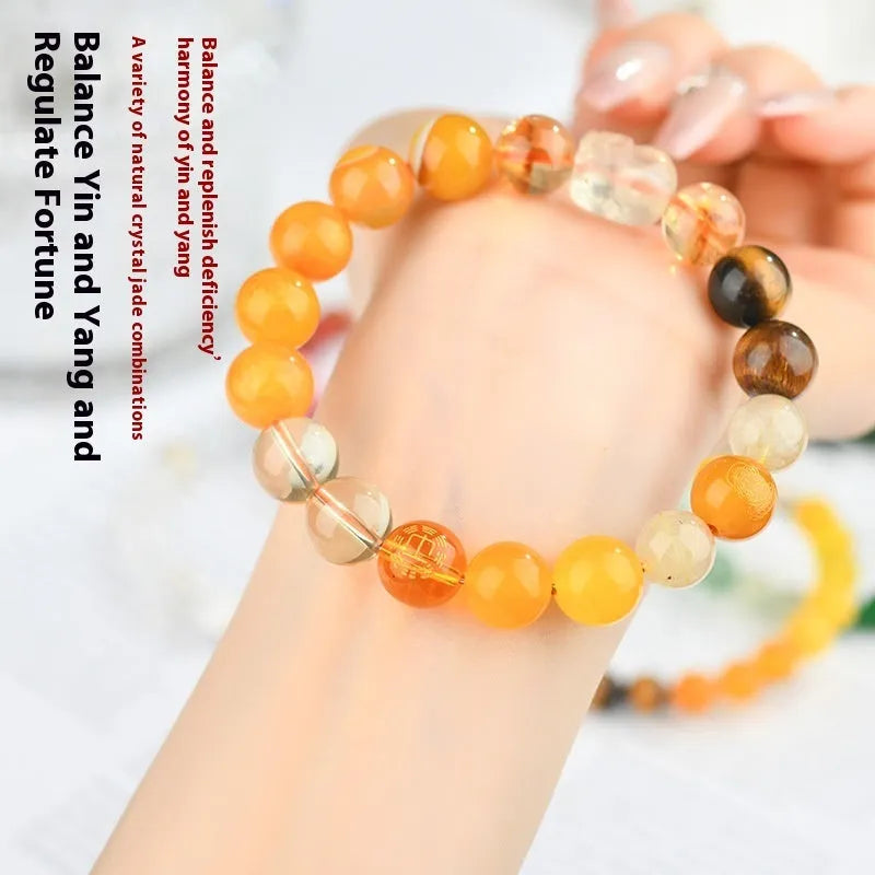 Handmade five elements crystal bracelet in gold, wood, water, fire, soil colours with geometric beads.
