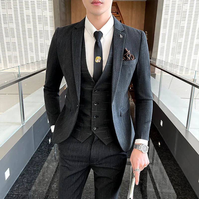 Slim fit men's business suit in British style available in black and dark grey colours