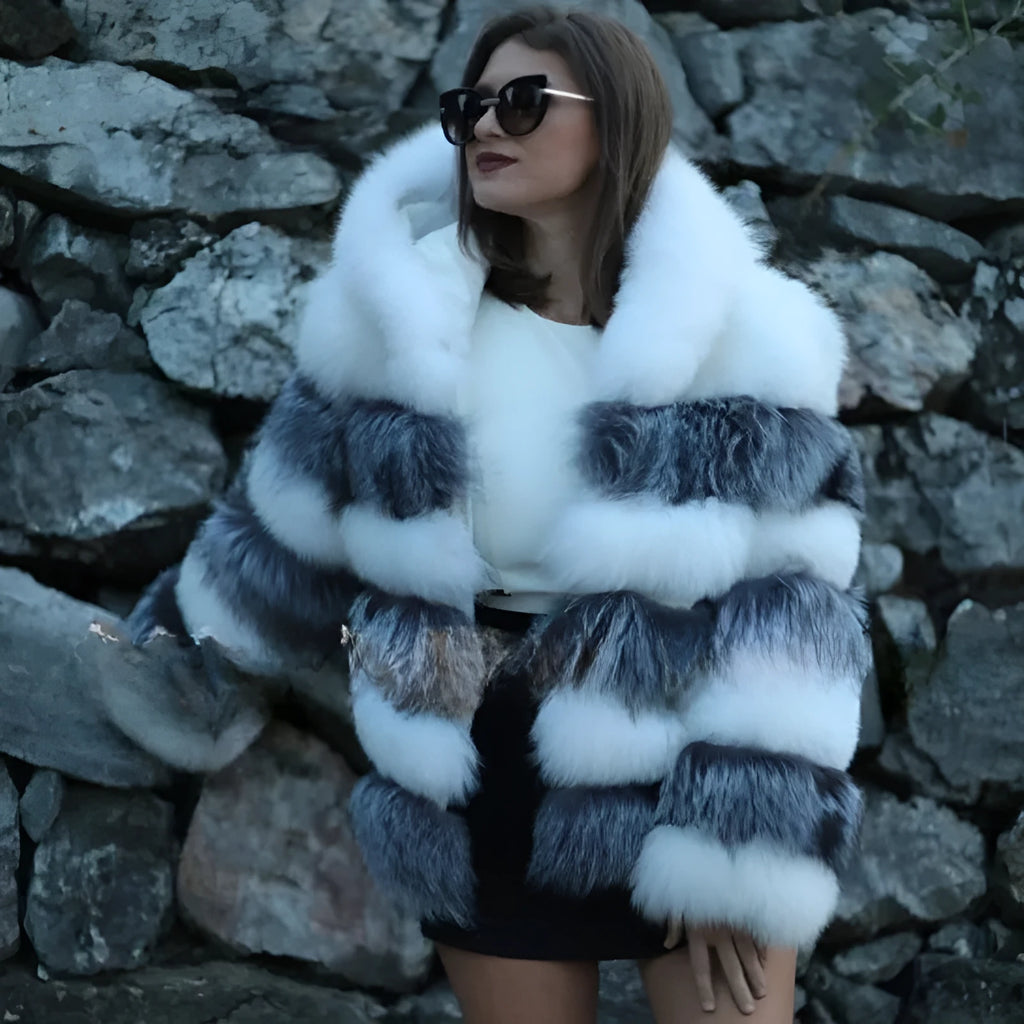 Women's loose artificial fur coat with detachable hood in street fashion style.