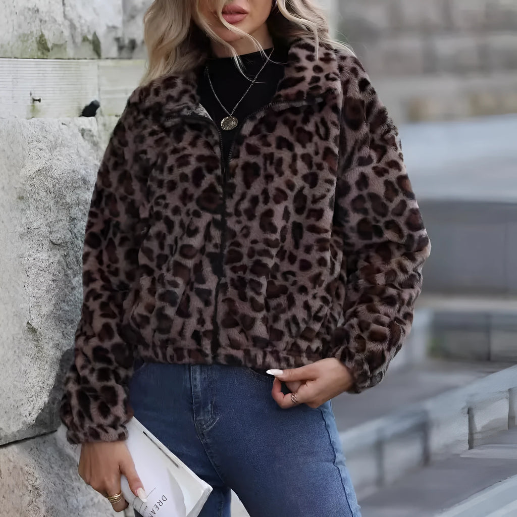 Women's loose-fitting leopard print plush coat with a front zipper and raglan sleeves.