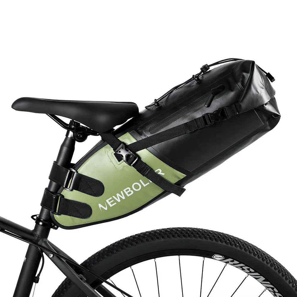 Yellow, black, and green 13-litre waterproof PVC bike tail bag mounted on a bicycle rear rack.