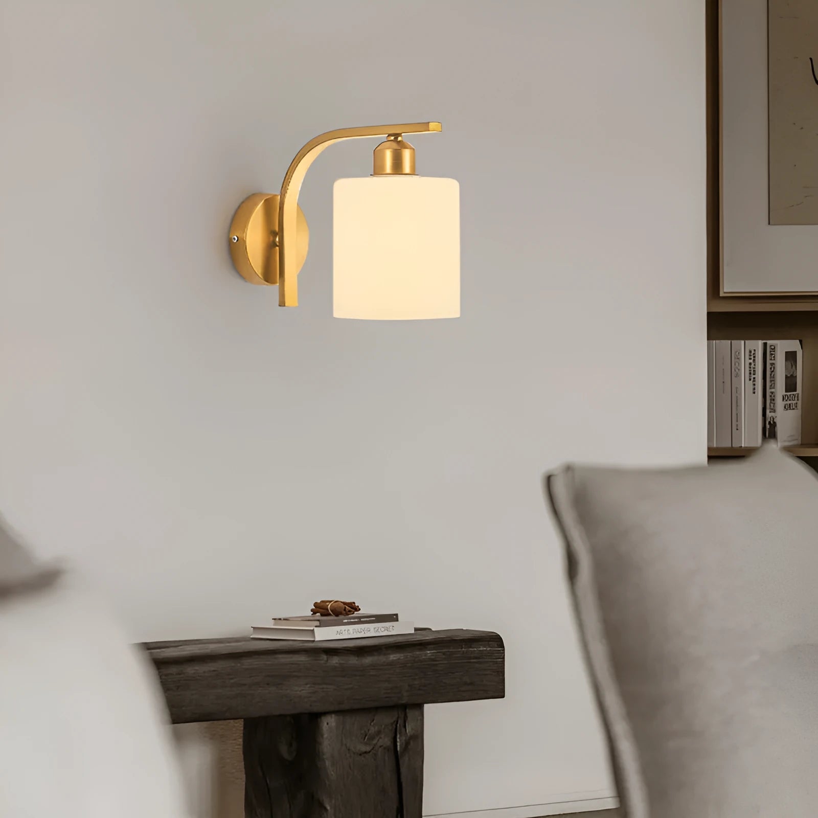 Modern copper coloured wall lamp with glass lampshade for bedroom or hallway lighting
