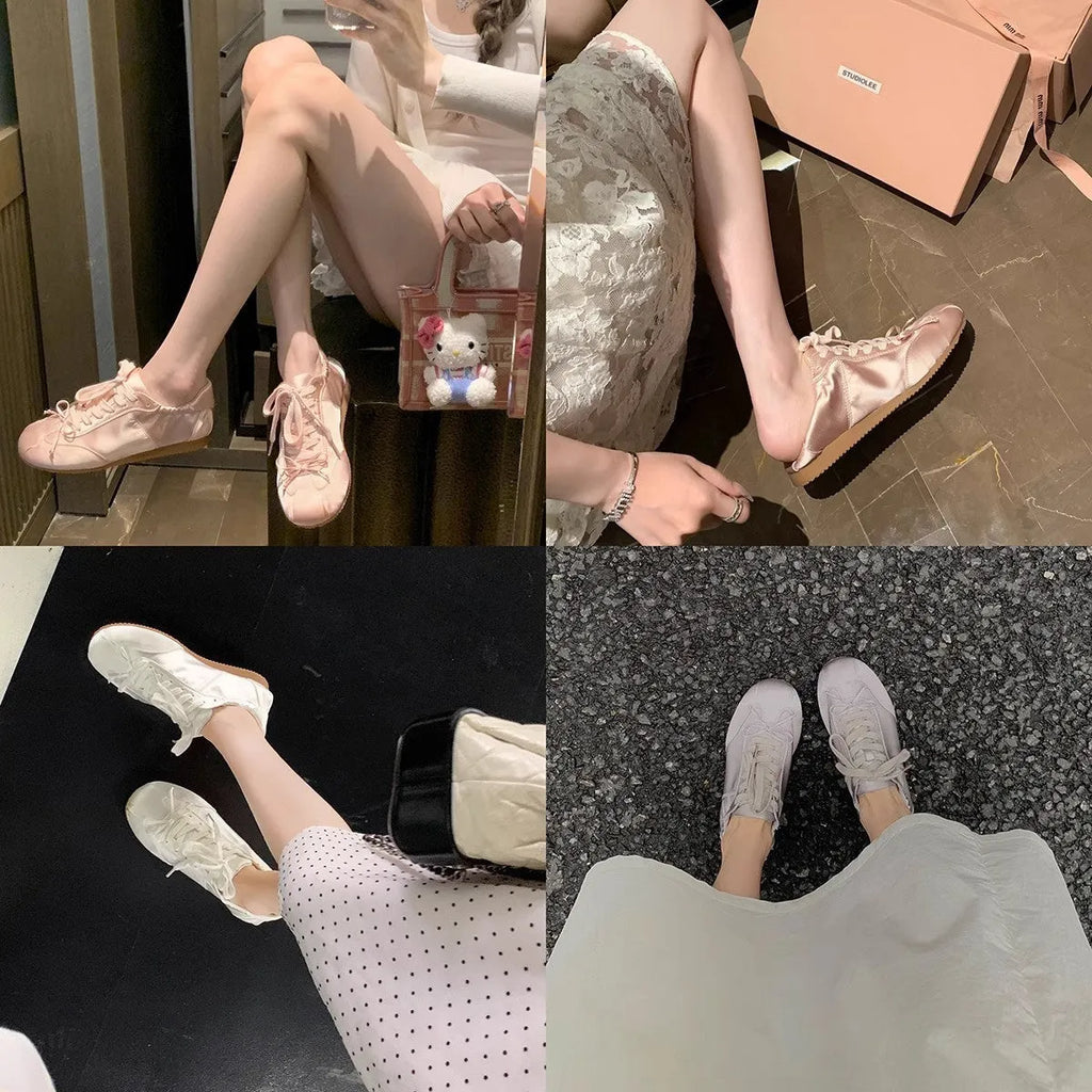 Women's champagne pink satin ballet flat shoes with a round toe and white front lace-up detail.
