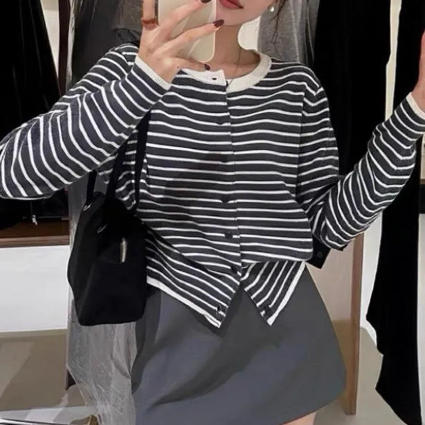 Dark grey and white striped slim fit cardigan coat for women with long sleeves.