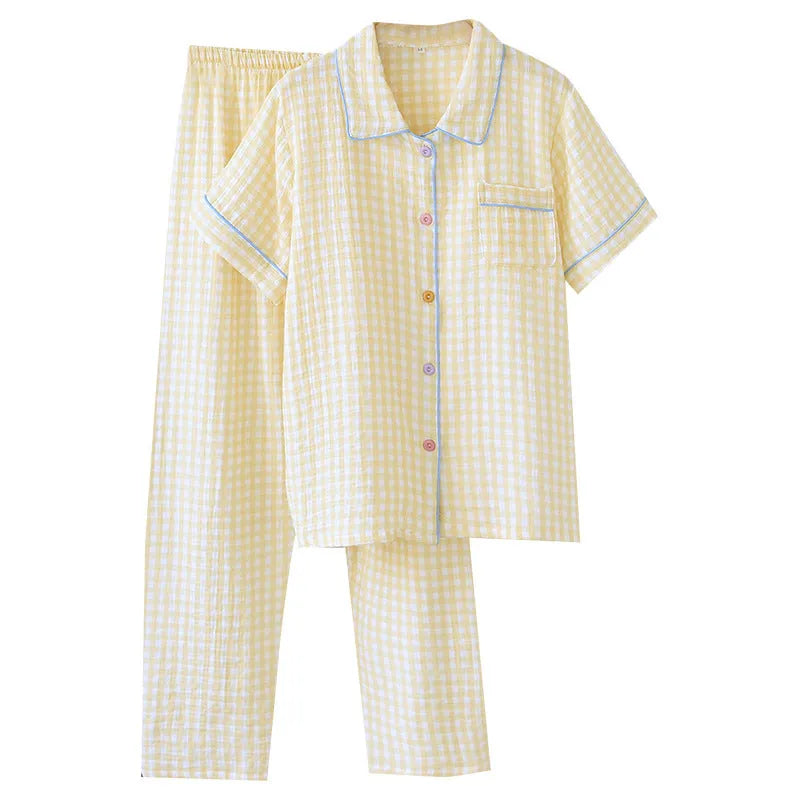 Women's casual cotton gauze short-sleeved top and trousers set in a loose fit for summer.