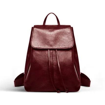 Black genuine leather women's backpack with multiple compartments and waterproof design