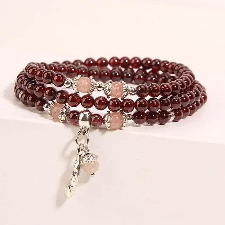 Original wine red garnet crystal flower bracelet with bohemian and ethnic design elements