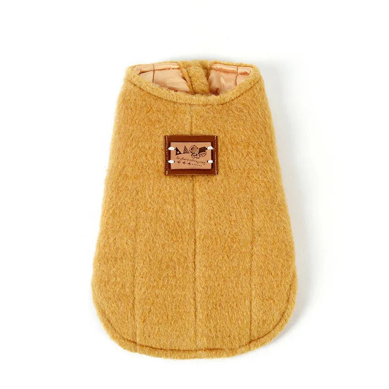 Small dog wearing a blue Korean-style cotton cashmere vest for autumn and winter pet clothing