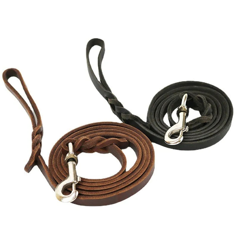Light brown cowhide dog walking rope with leather hand loop, shown at full length.