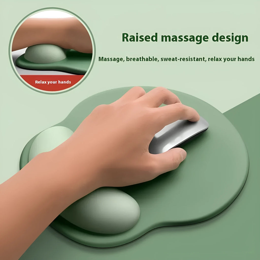 Silicone mouse mat with integrated wristband pad in a solid colour on a desk.