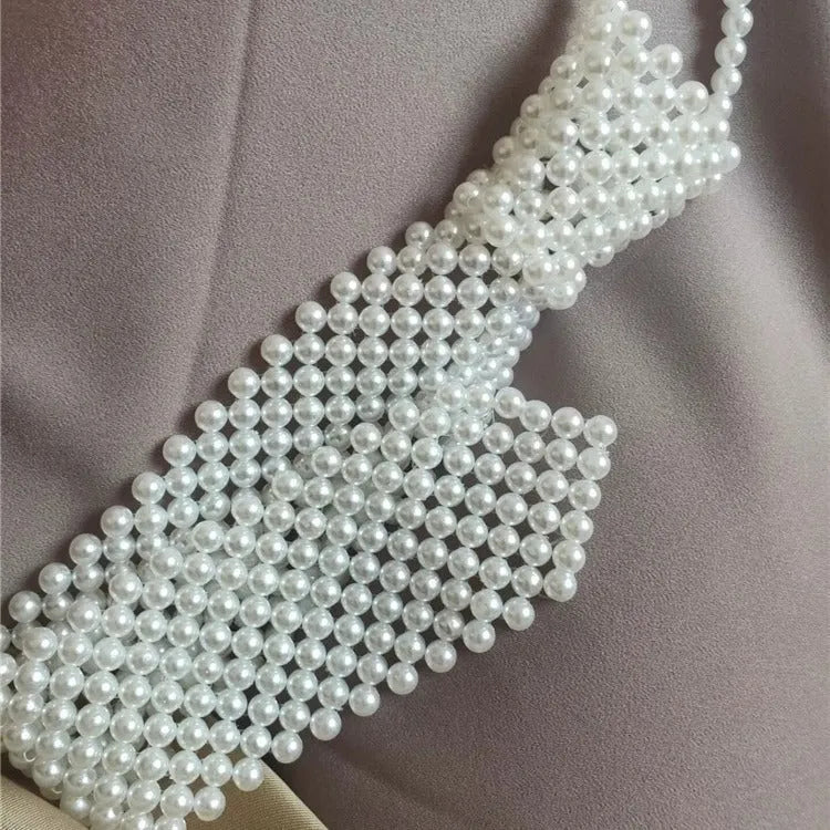 Women's pearl tie body chain jewellery with hollow-out retro design and alloy fastening