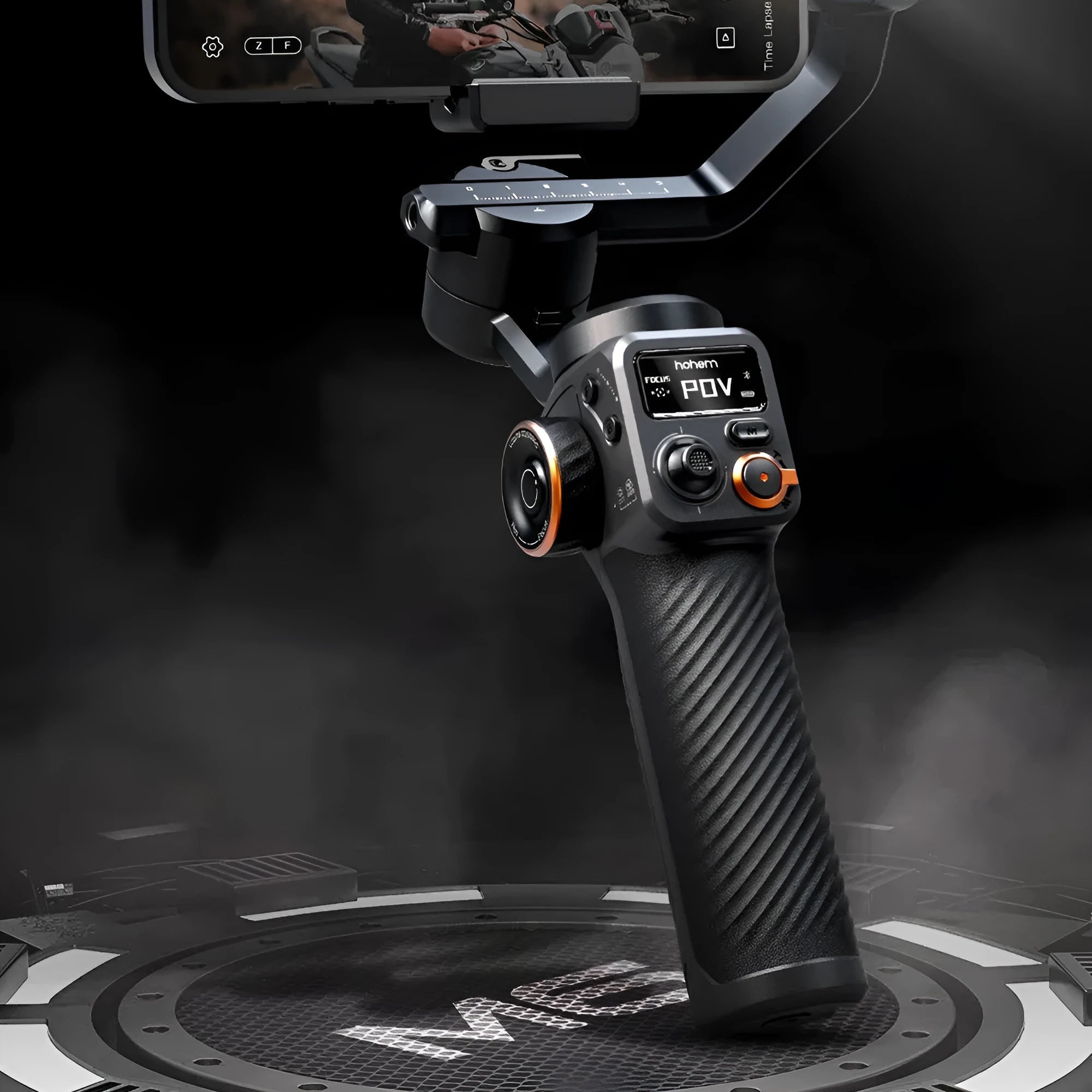 Black AI face tracking smartphone gimbal stabiliser with magnetic fill light attached and tripod extended.