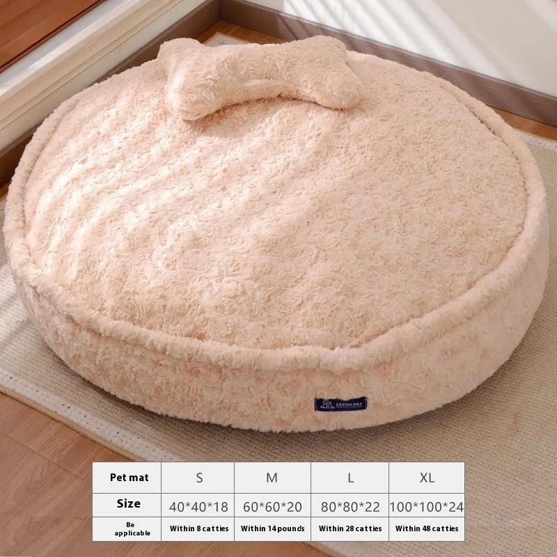 Round nest style pet bed in a milk tea colour with a removable cloth cover.