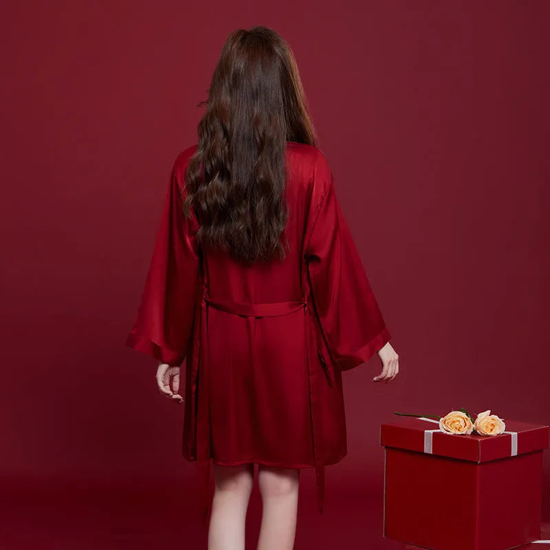 Red ice silk matching men's and women's long sleeve trousers sleepwear set for wedding dowry.