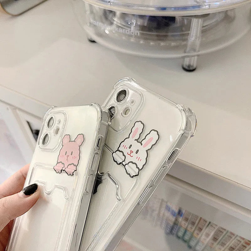 Transparent cartoon design TPU phone case with card holder slot for Apple iPhone.