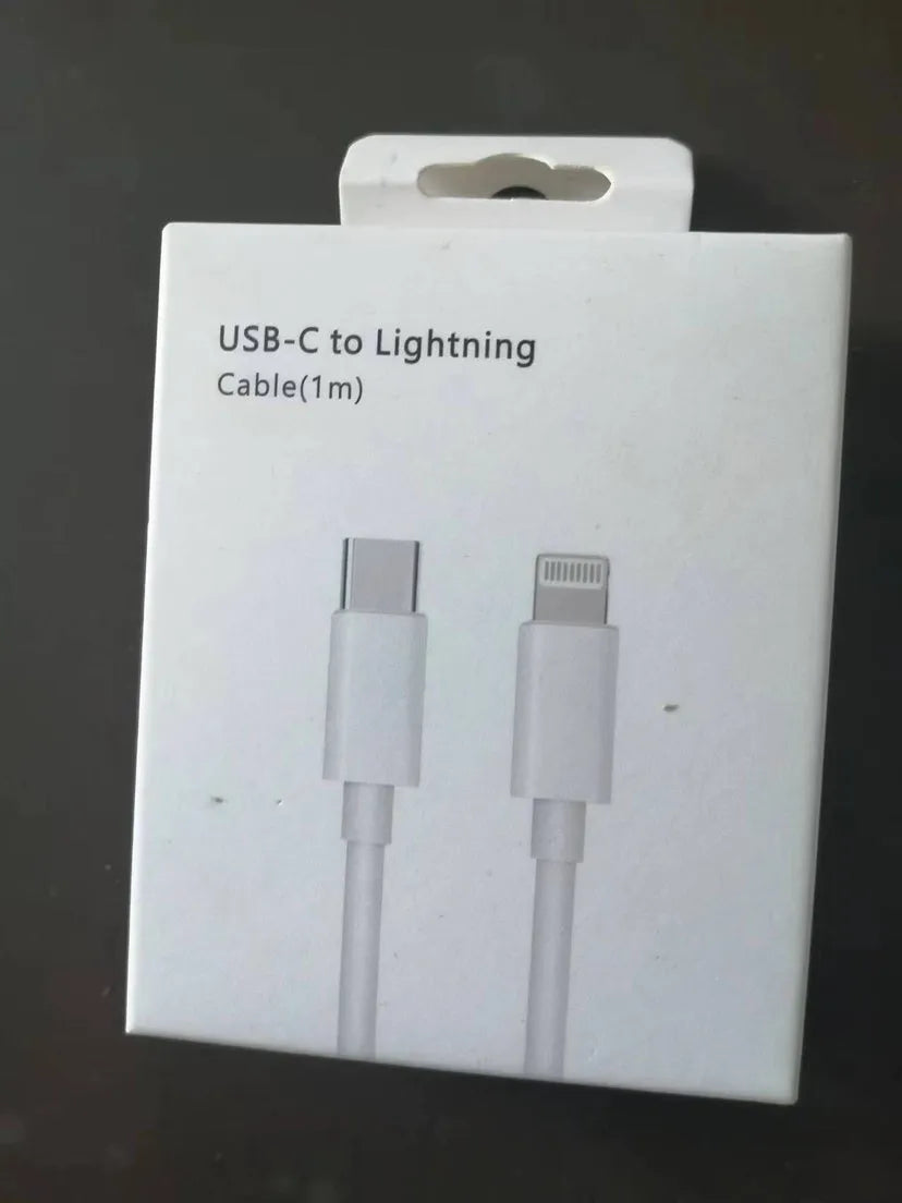 White 20W PD fast charger with UK plug and a USB Type-C charging cable.