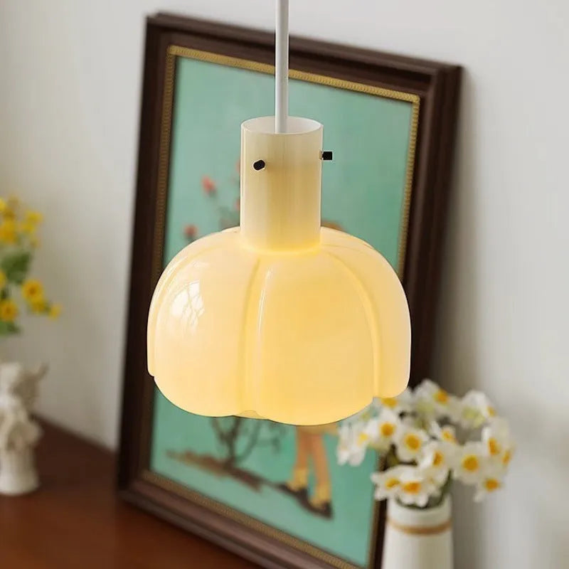Retro medieval style glass bud chandelier pendant light for ceiling installation.