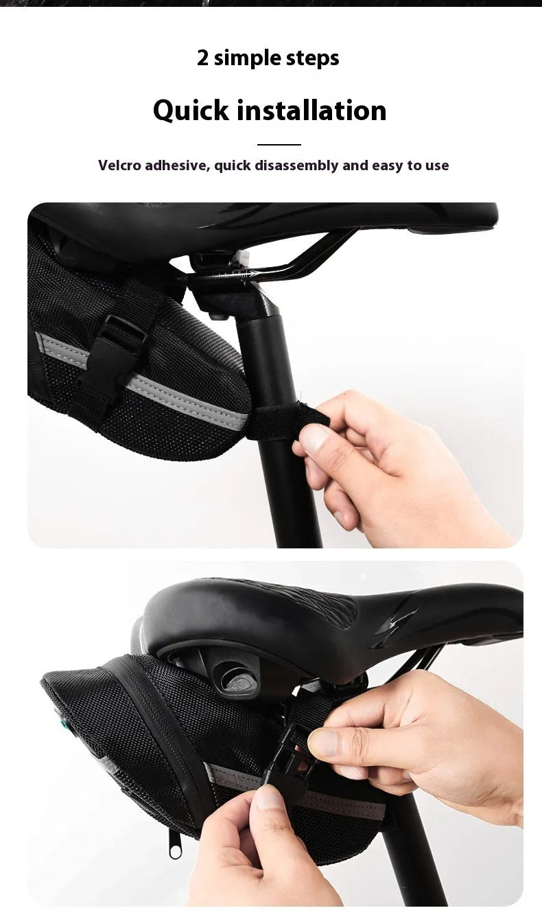 Black quick release bicycle saddle bag mounted under a bike seat