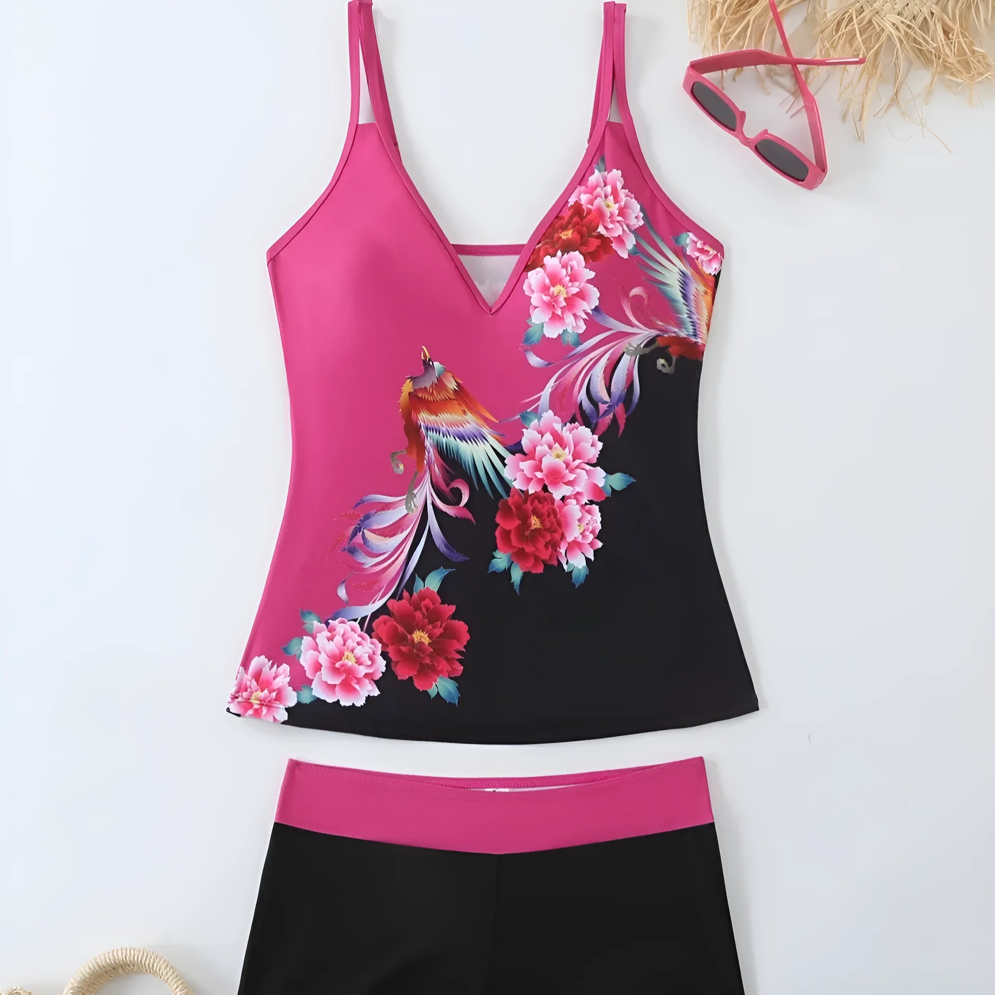 Plus size women's printed two-piece swimsuit in black or rose red with brief bottoms.