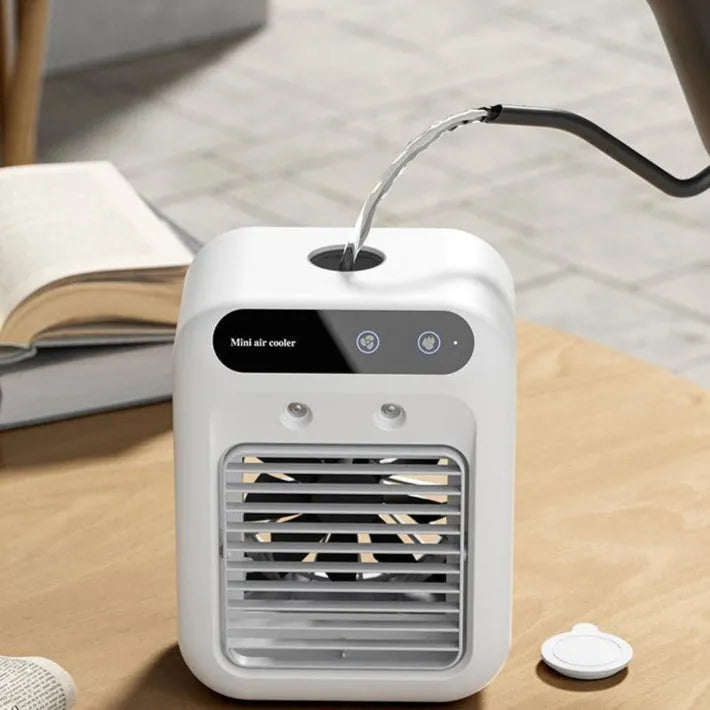 Ivory white portable USB air cooler fan with touchscreen panel on a desk