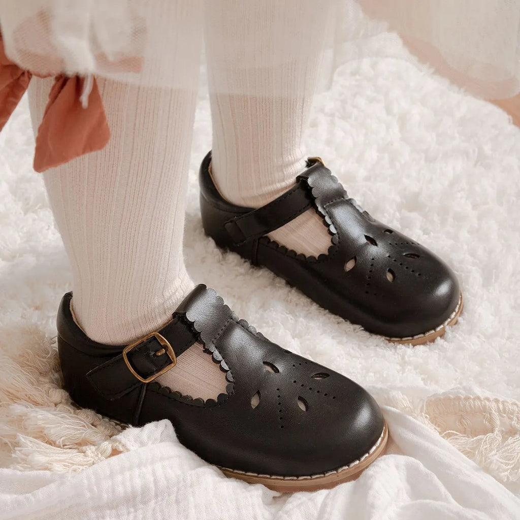 Girls British style PU leather shoes with hollow breathable upper and Velcro fastening, available in black