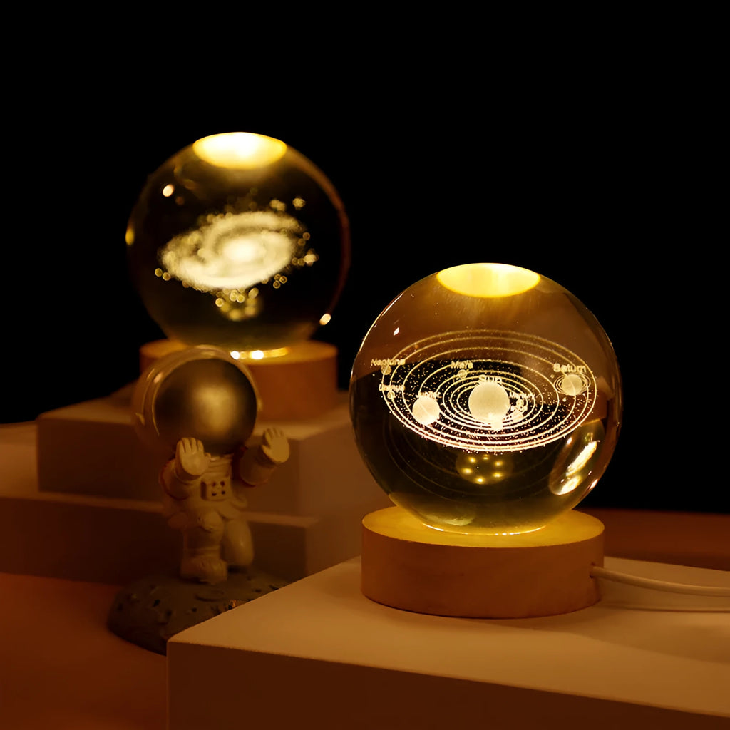 Luminous crystal ball night light with USB plug-in, 6cm or 8cm ball, wooden base and astronaut push option.