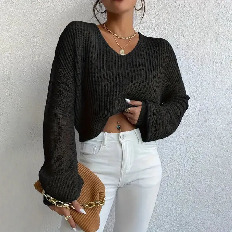 Women's solid colour long sleeve casual pullover in a loose fit, shown in various colours.
