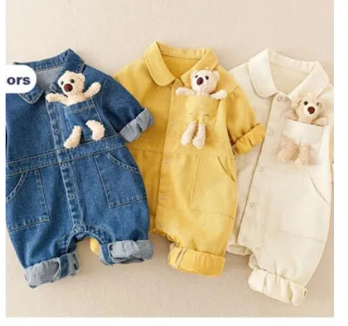 Baby boy wearing blue denim jumpsuit with teddy bear accessory, western style for Spring Festival