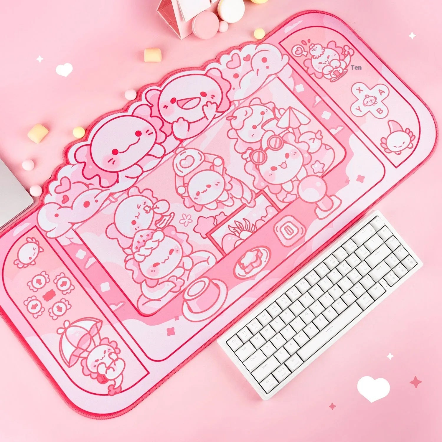 Large rectangular cloth mouse pad with hexagonal dragon crane machine cartoon design, shown on a desk.