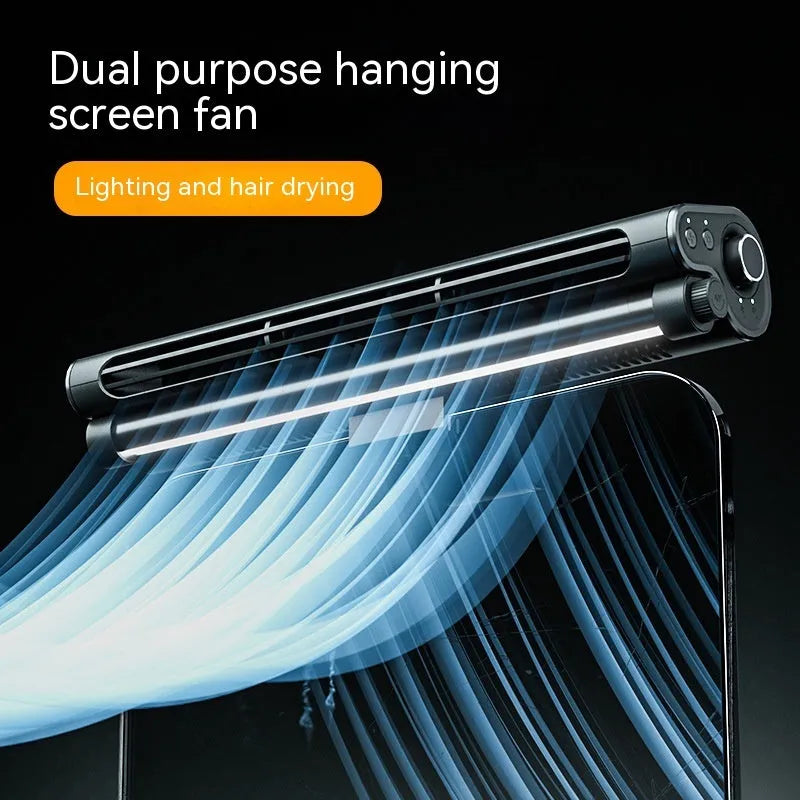 Black USB bladeless desk fan with a clamp, attached to a laptop screen, showing its integrated lighting lamp.