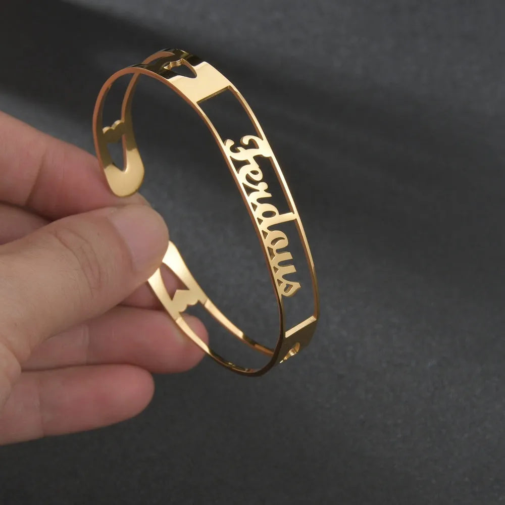 Customized name bracelet in stainless steel with silver, gold, or rose gold finish and 3mm, 6mm, or 10mm size options.