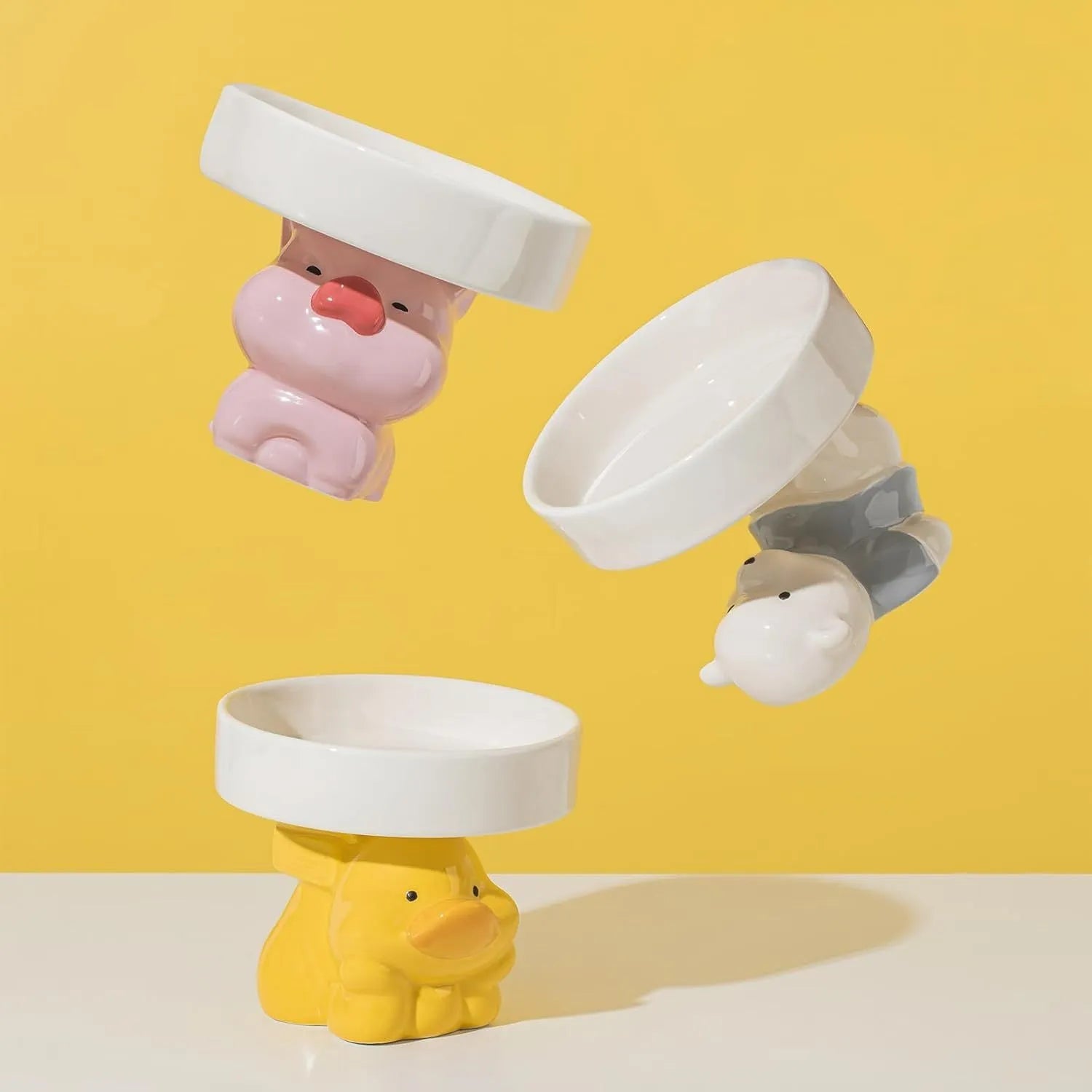Raised ceramic cat bowl in animal design, showing 4.92-inch height and wide 15cm bowl.