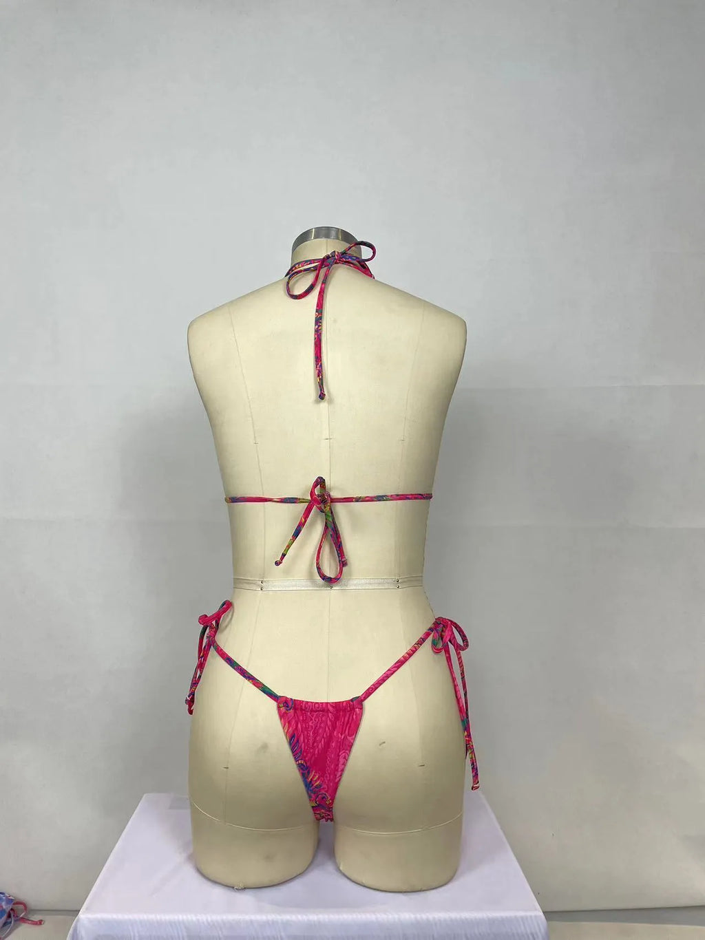 Pink printed women's bikini two-piece set with multiple style options for swimming