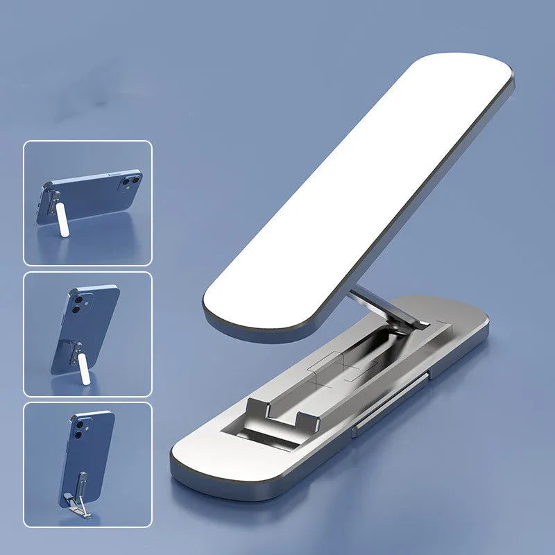Foldable aluminium phone holder in silver, 55x14x4.5mm, with 360° rotation and 180° extension.