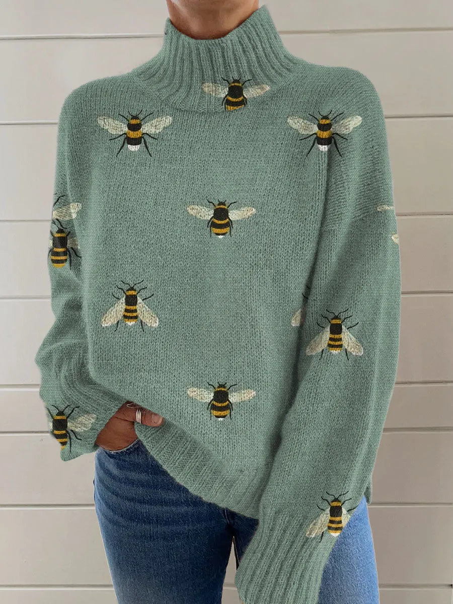 Women's loose fit Christmas printed turtleneck sweater with long sleeves in a macaron colour.