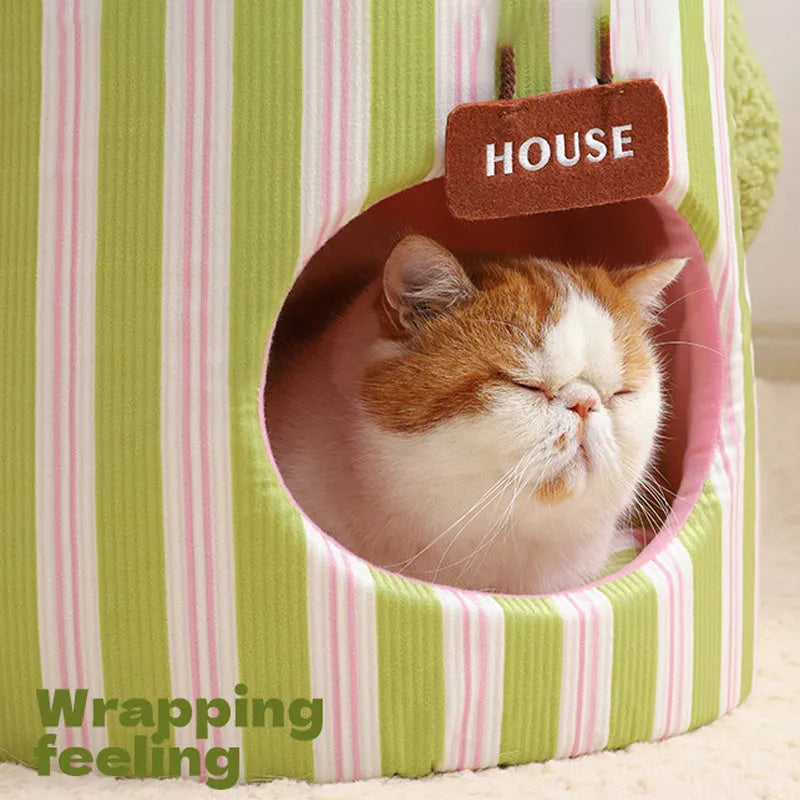 Green cauliflower-shaped enclosed pet house with a round entrance hole for a small dog or cat.