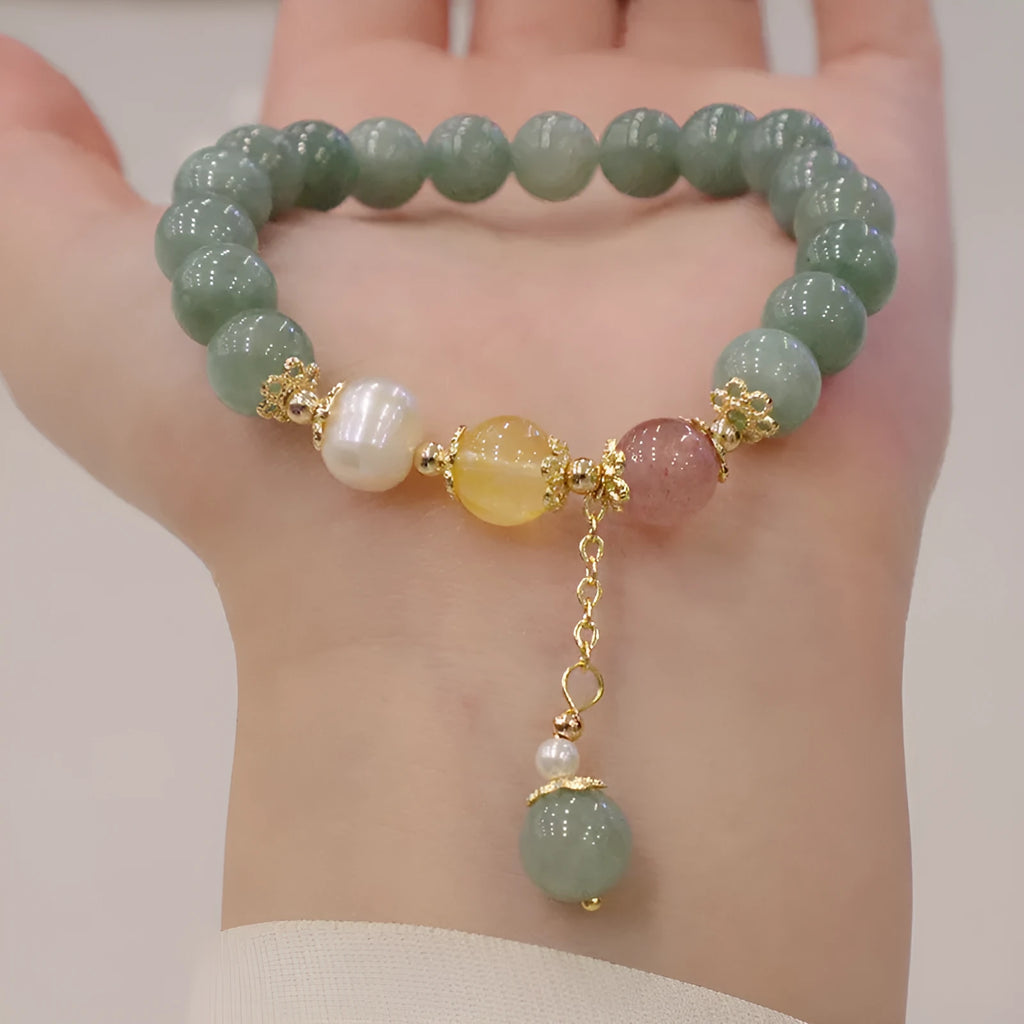 Geometric jade and pearl bracelet ornament in Han style with three-dimensional decoration.