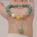 Geometric jade and pearl bracelet ornament in Han style with three-dimensional decoration.